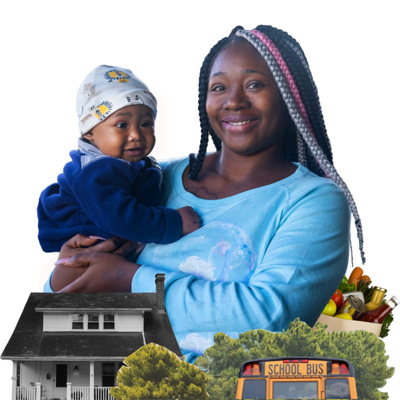 Woman holding child with image of house and school bus